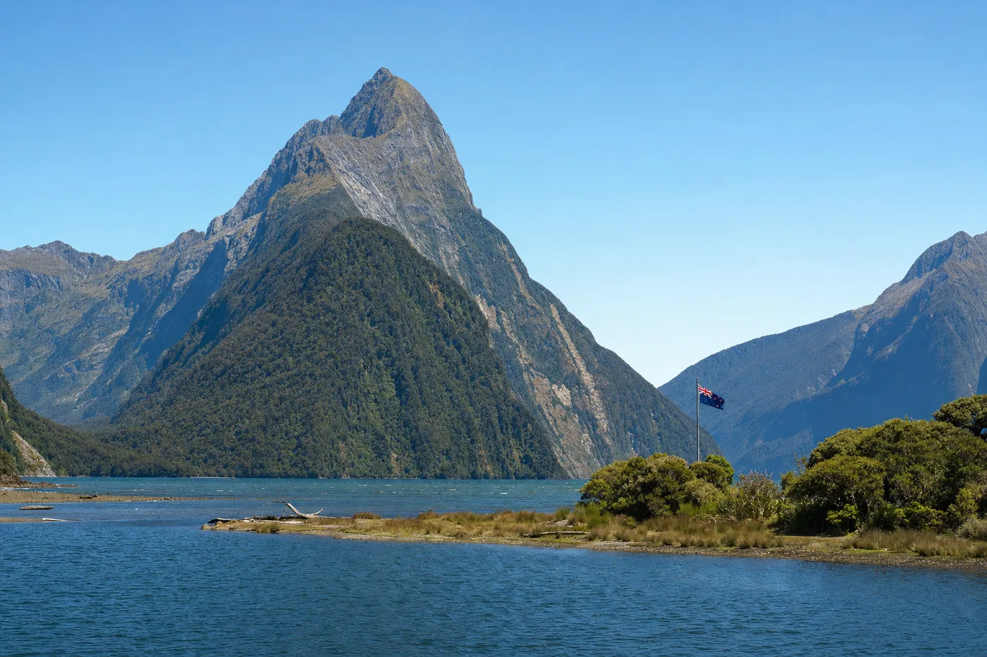Neuseeland – bekanntes Wahrzeichen mit der Landesflagge